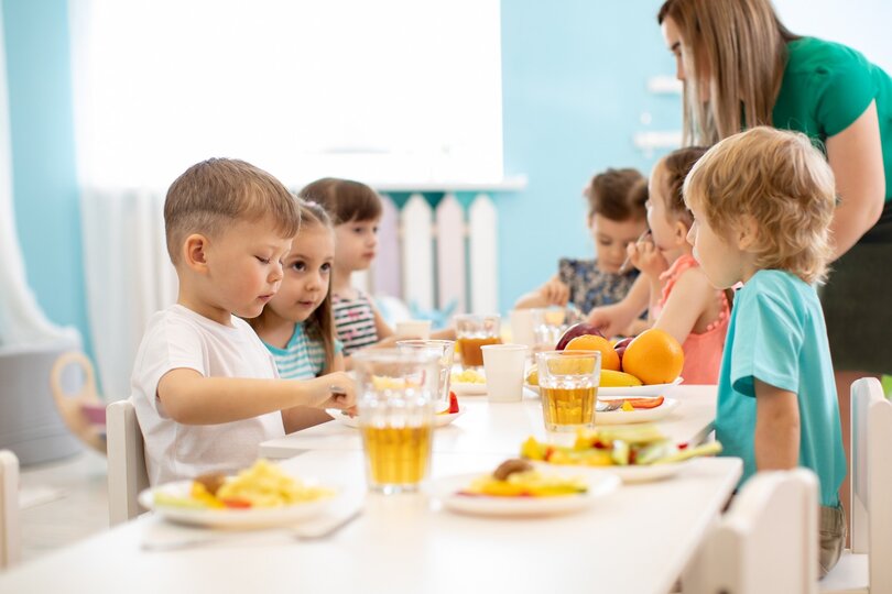 Kindergarten children have fruit break