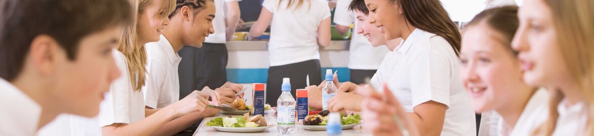 Food services by Dussmann Pupils eat lunch in canteen